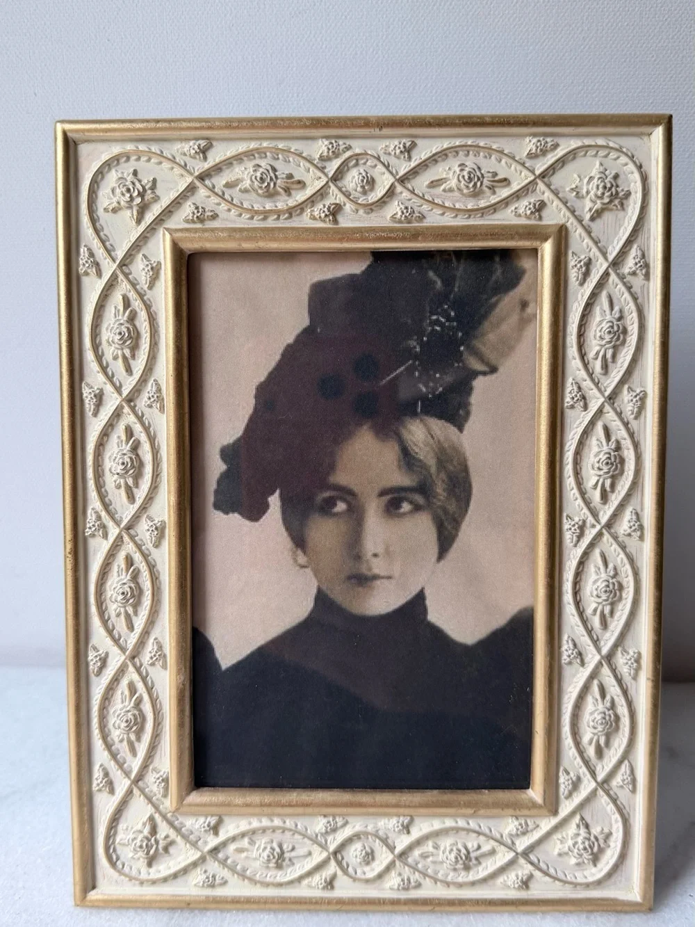 White metal decorative picture frame with gold accents